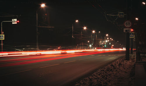 Light trails on city street at night