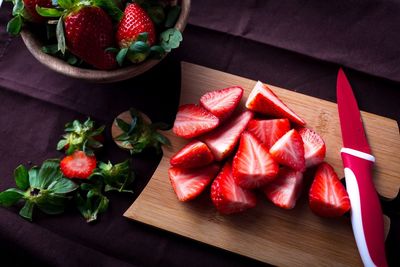 High angle view of strawberries on table