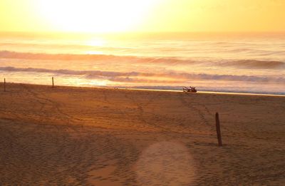 Scenic view of sea at sunset