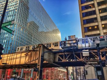 Low angle view of buildings in city against sky