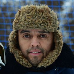 Close-up portrait of man in fur coat