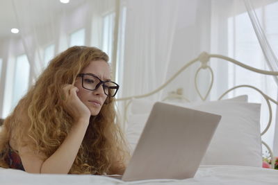 Young woman using mobile phone