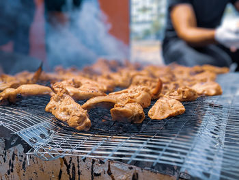 Close-up of meat on barbecue grill