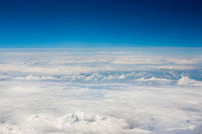 Aerial view of cloudscape against blue sky