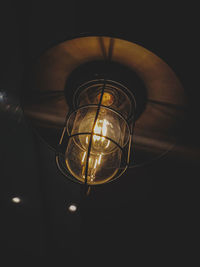 Low angle view of illuminated light bulb