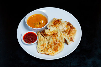 High angle view of breakfast served on table