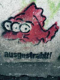 Close-up of painting on wall