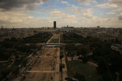 High angle view of buildings against cloudy sky