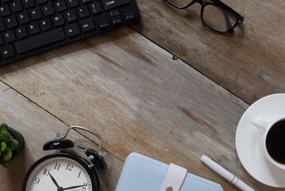 High angle view of coffee cup on table