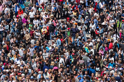 High angle view of group of people in the street