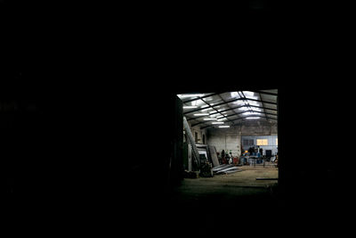 Interior of spacious industrial workshop with various metal elements and constructions in industrial building