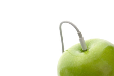 Close-up of apple against white background