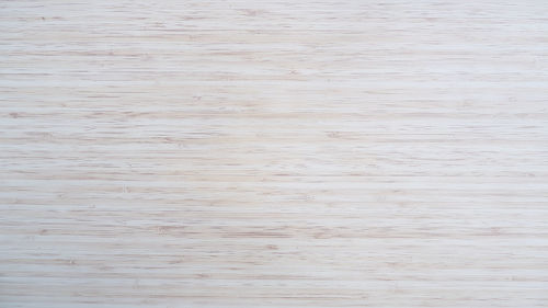 High angle view of water on wooden table