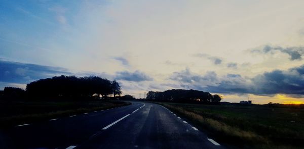 Road against sky during sunset