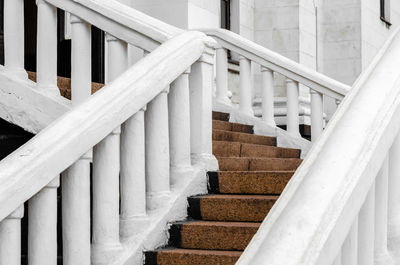 Close-up of white staircase in building