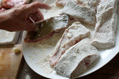 High angle view of person preparing food