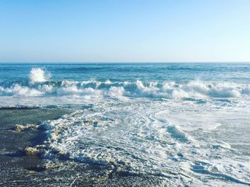 Scenic view of sea against clear sky