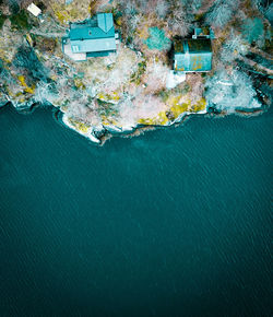 High angle view of rocks by sea