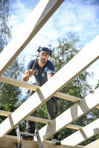 Carpenter working on roof