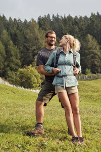 Full length of couple standing on land