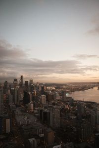 High angle view of buildings in city against sky