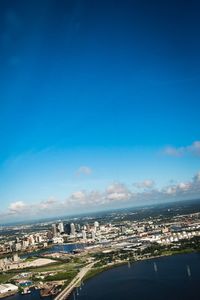 High angle view of city against cloudy sky