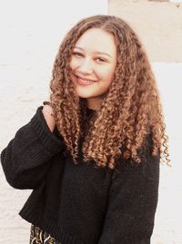 Portrait of smiling young woman in winter