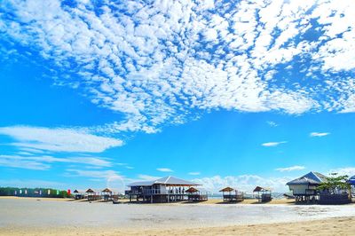 Scenic view of sea against blue sky