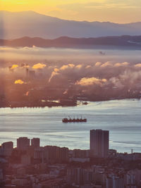 A sunrise over an industrial area.