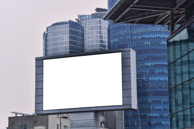 Low angle view of modern buildings against sky