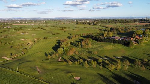 High angle view of agricultural field against sky