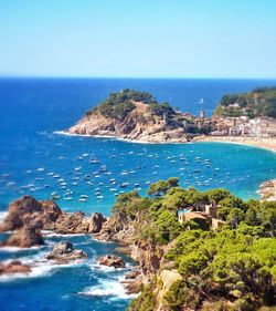 Scenic view of sea against blue sky