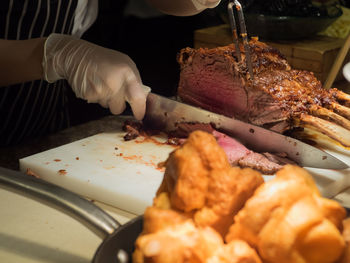 Close-up of person preparing food