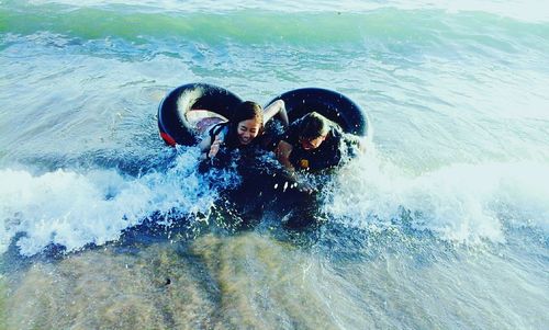 Man splashing water in sea