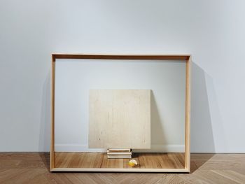 Wooden table against wall at home