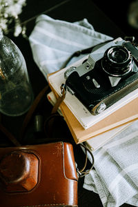 Close-up of camera on table