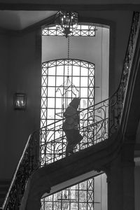 Low angle view of man standing on steps