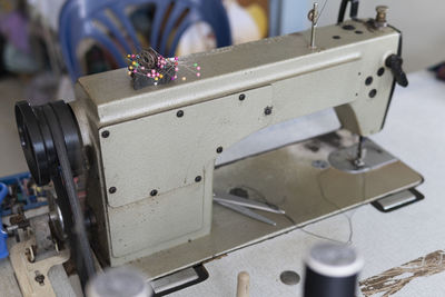 Close-up of machinery on table