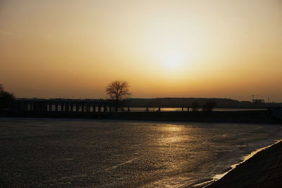 Scenic view of river during sunset