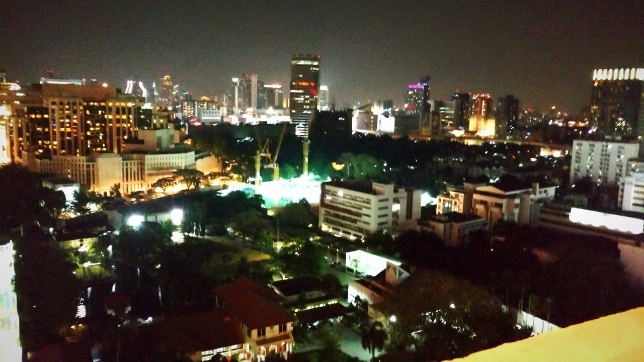 ILLUMINATED CITY AT NIGHT