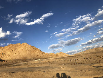 Scenic view of desert against sky