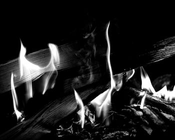 Close-up of fire against black background