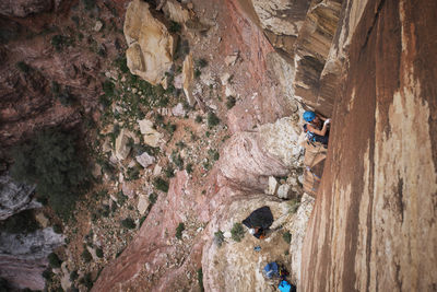 Female hiker climbing mountains at red rock canyon national conservation area