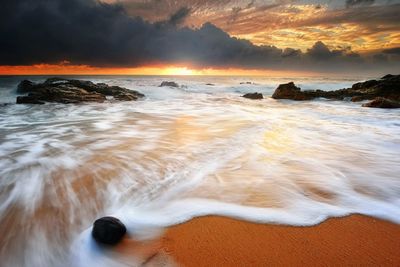 Scenic view of sea during sunset