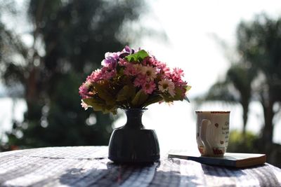 Close-up of flower vase on table