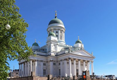 Low angle view of building against blue sky