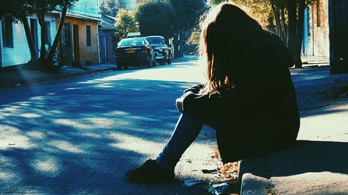 Rear view of woman looking away