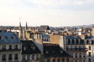 Paris cityscape against sky