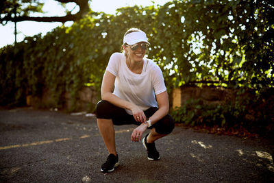 Outdoor portrait of an athletic woman.