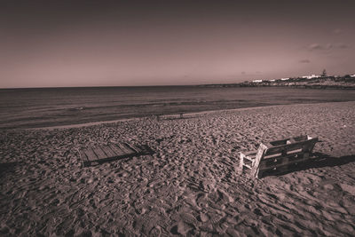 Scenic view of beach against clear sky